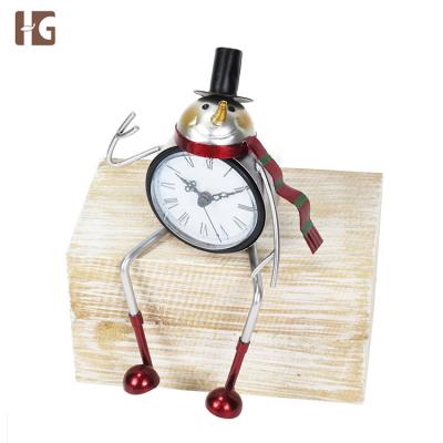 China China Wholesale Unique Design Popular Metal Snowman Clock for sale