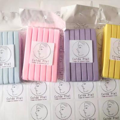 China Expanded in Water 12pcs/bag Spa Cellulose Sponge Compressed Facial Makeup Remover Sponge Cleansing Stick for sale