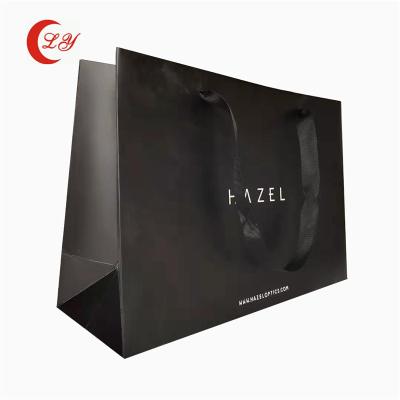 China Recyclable made in china recycled custom paper bag black gift bags with your own logo for sale