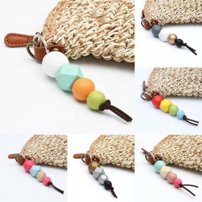 China Daily costumes or gifts for special occasion Moyamiya handbag hooks 4 handmade colorful wooden beads bag hooks keychains accessories for sale