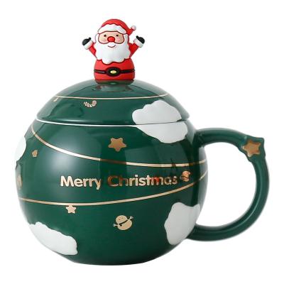 China Sustainable Wholesale Cute Planet Shape Ceramic Christmas Heater Coffee Mug With Spoon for sale