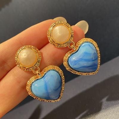 China Retro Women's Turquoise Others Love Stud Earrings Fashion Blue Dangle Fashion Luminous Stone Earrings for sale