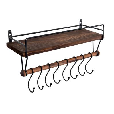 China Sustainable Rustic Antique Wooden Spice Rack Wall Hook Kitchen Storage Shelf With Towel Rack for sale