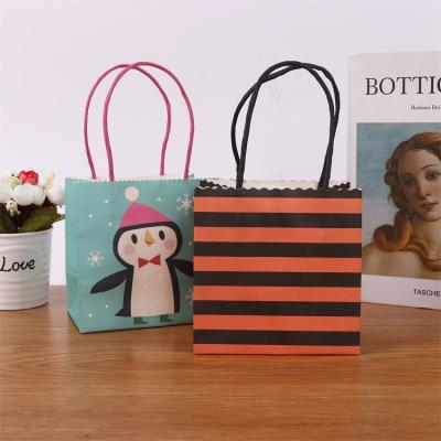 China Recyclable Wholesale Custom Portable Cartoon Pattern Paper Kraft  Packaging Shopping Bags for sale