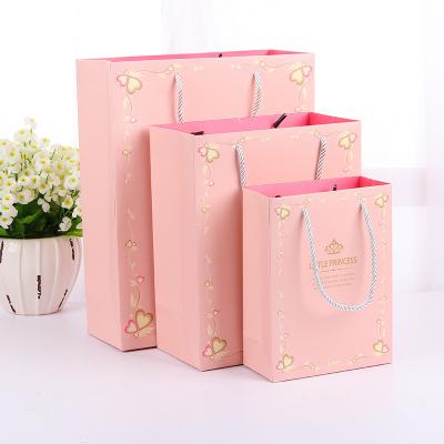 China Recyclable Wholesale Custom Design Portable Paper Bag For Gift Packaging Shopping Bags for sale