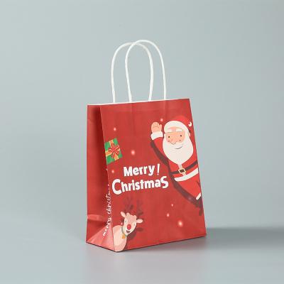 China Recyclable Custom Design Portable Christmas Kraft Paper Gift Bag Holiday Packaging  Bags for sale