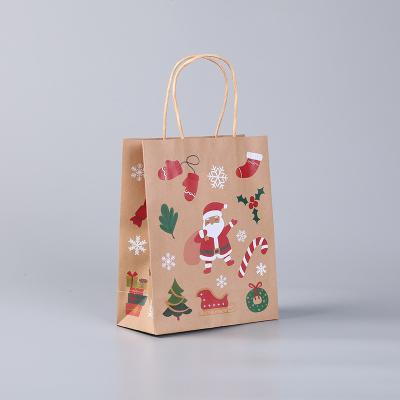 China Recyclable Custom Logo Printed Christmas Kraft Paper Gift Bag With Twisted Handles for sale