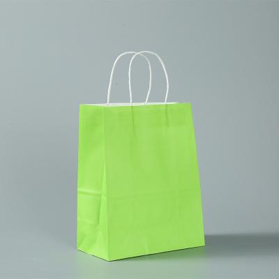 China Recyclable Custom Color Portable Kraft Paper Bag Packaging Shopping Bags for sale