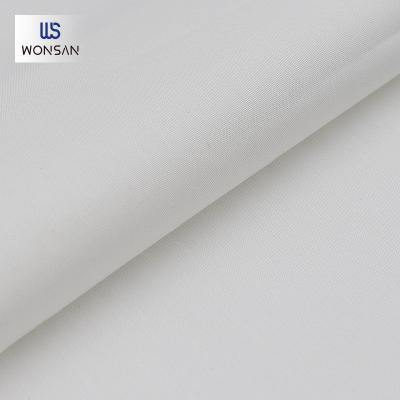 China Breathable Warm Cotton Spandex Nylon Products Poplin Woven Fabric Plain Shirts Blouses Fabric 105GSM for sale