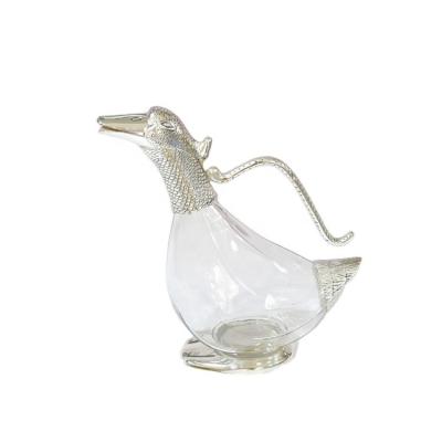 China Cute Iron Edge Shape Banquet Duck Modern Home Wedding Glass Wine Decanter With Handle for sale