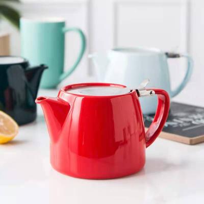 China Viable Wholesale Various Colors Ceramic Water Tea Kettles With Mesh Filter for sale