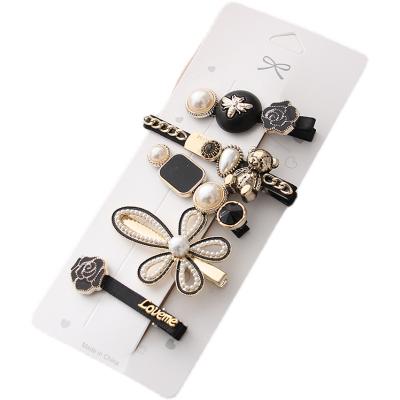 China Fashion Stylish Black Elegant Bear Pearl Korean Hair Clip Set For Women for sale