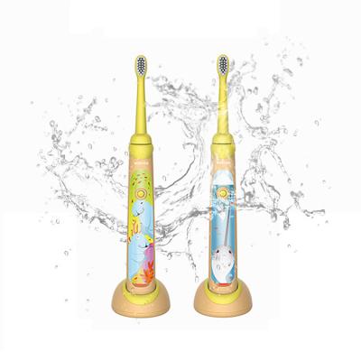 China New Dupont Bristle Silicone Rechargeable Electric Children Sonic Toothbrush Cartoon Yellow Magnetic Board for sale