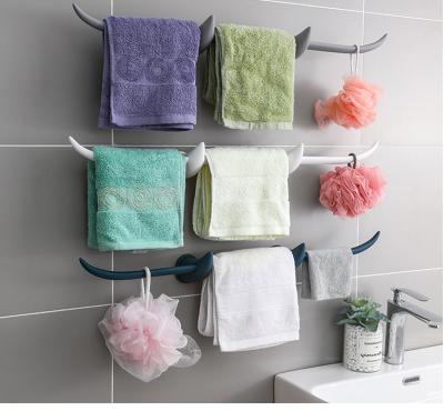 China Storage Horn Viable Towel Wall Bathroom Towel Rack Hanging Shelf Nail And Punch Free Holder for sale