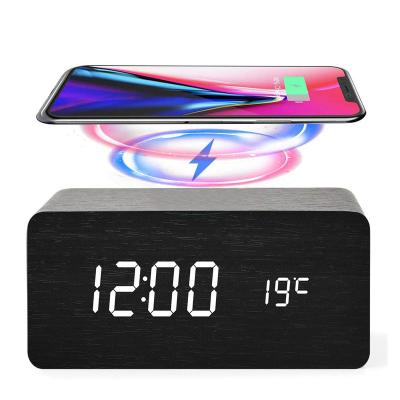 China Multi Product As Digital Time-Temperature Wooden Alarm Clock Voice Control Wooden QI LED Calendar Display Wireless Charging Wireless Charger for sale