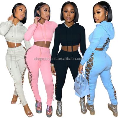 China 2021 Autumn Women's Clothing QUICK DRY Good Quality Hollow Out Hood Sweatsuit Women Tracksuit Set Two Piece for sale