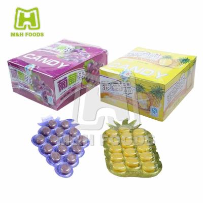 China Natural Candy Product Type Fruit Pineapple And Grape Shaped Flavors String Hard Candy for sale