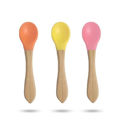 China Factory Customized BPA Free Feeding Spoon BPA New 2021 Soft Silicone Spoon For Baby Food Feeder Handle Silicone Bamboo Baby Spoons for sale