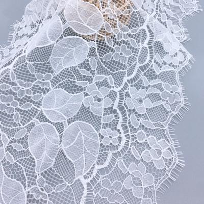 China 22CM White Soft Flower Guipure Lace Fabric Fancy Lace Fabric Wrap Knitting Non-Elastic Lace For African Wedding Dress for sale