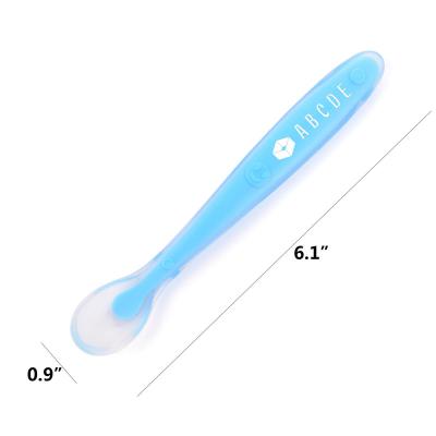 China Low MOQ BPA Free Customized Logo Soft Newborn Silicone Baby Feeding Spoon for sale