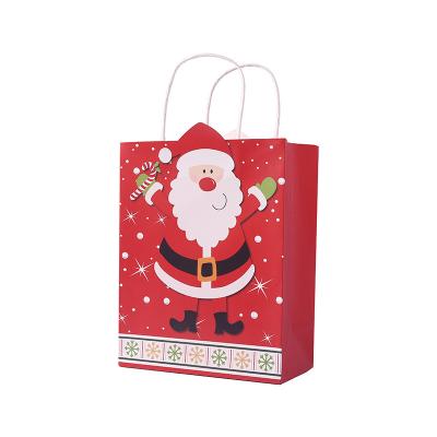 China Large Christmas Holiday Stocked 2 Designs 2 Class Xmas Christmas Gift Storage Paper Bag for sale