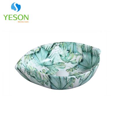 China Modern Green Design Bathroom Sink Marble Shape Leaf Ceramic Wash Basin for sale