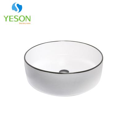 China Modern Luxury Slim Matte White Black Line Bathroom Wash Basin Edge Round Shape Basin for sale