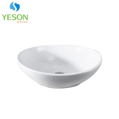 China RS1101 Modern Oval White Vessel Full Sink Ceramic Art Basin Glossy White Basin for sale