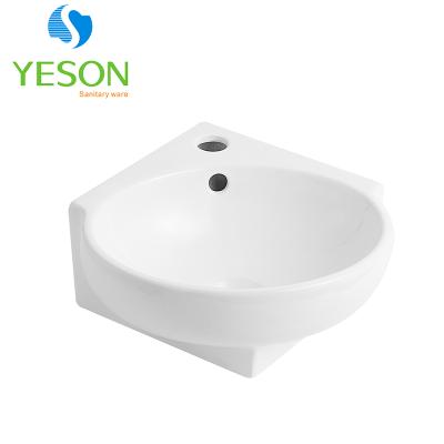 China Corner Wash Basins RS1104 Small Wall Hung Ceramic Hand Corner Wash Basins for sale