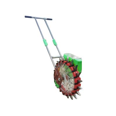 China Seed Planting Machine 20 Nozzle Hand Push Seeder For Corn Cotton With Steel Material Body for sale