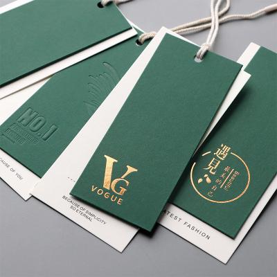 China Custom Luxury CLOTHING Hanging Label With Clamps Free Special Swing Paper Product Hang Tags For Apparel Garment for sale