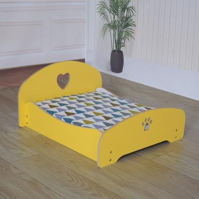 China Autumn And Winter Love Pet Dog Wooden Bed Candy Breathable Soft Pet Bed for sale