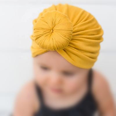 China Fashion Cute Baby Donut Hat Cotton Beanie Cap Multicolor Infant Turban Toddler Solid Elastic Newborn Eco-friendly Cozy Hats for sale