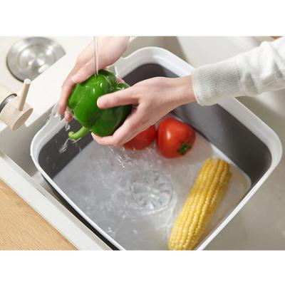 China Sink Viable Folding Drain Basket With Handle Kitchen Fruit And Vegetable Storage Basket Collapsible Telescopic Sink for sale