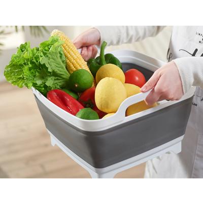 China Hot Selling Viable Sink Folding Drain Basket With Handle Kitchen Fruit And Storage Aegeable Basket Folding Wash Basin for sale