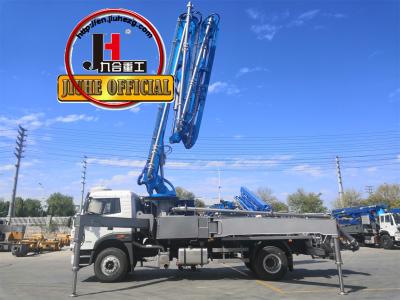 China JIUHE 38M concrete boom pump for trucks with flexible and big capacity pumping zu verkaufen