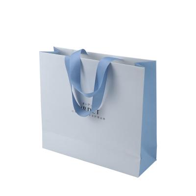 China Hot Selling Custom Logo Cosmetic Coffee Tote Luxury Gift Apparel Craft Paper Shopping Bags Recyclable With Handles for sale