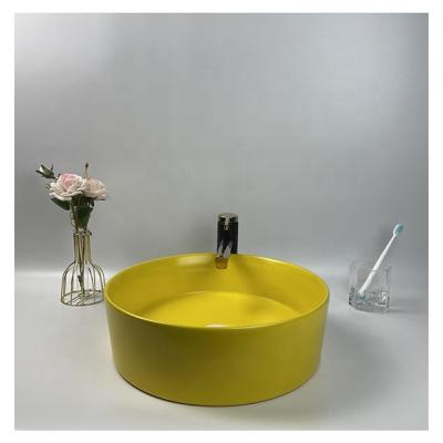 China Modern Europea Style Art Wash Basin Matte Yellow Stone Basin Sink Ceramic Basin Basin for sale