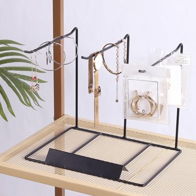 China Bedroom Countertop Display Rack For Jewelry Storage Rack Black Metal Hanging Rack For Necklace Storage for sale