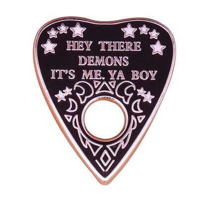 China High Quality Exquisite Enamel Pin Divination Board Enamel American Black Spooky Demon Pin for sale