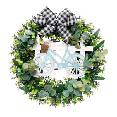 China 2022 Wholesale Christmast Ornament Door Decoration Artificial Eucalyptus Leaf Wreath Wreath With Bowknot for sale