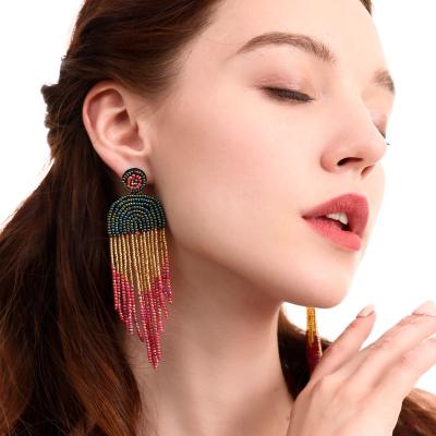 China Ethnic Style Women Designer Classic Retro Pearl Long Dangle Earrings Long Ethnic Elegant Handmade Bohemian Colorful Tassel Jewelry for sale