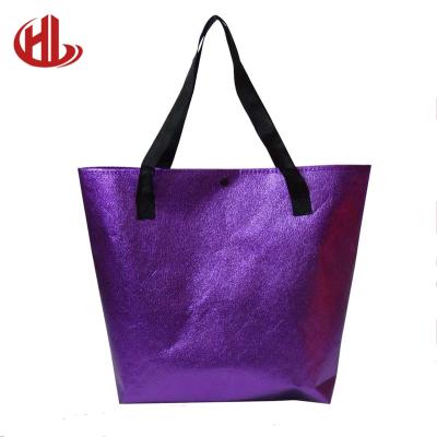 China Recyclable Purple Glossy And Customized Non Woven Gift Tote Shopping Bags for sale