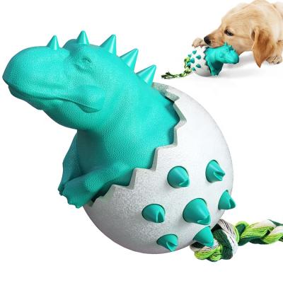 China Hotselling 6 Colors Dinosaur Egg Plastic Silicone Chew Resistant Durable Pet Toothbrush Toy for sale