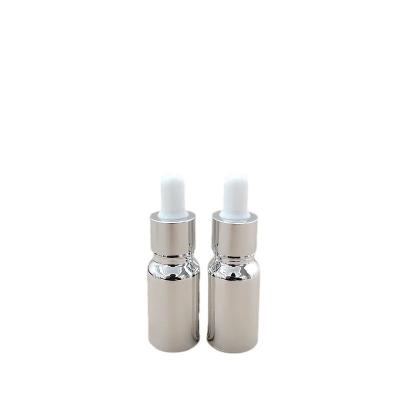 China Silver Coated Glass Essence Oil Perfume Bottles Liquid Reagent Pipette Dropper Bottle 10ml 15ml 20ml 30ml 50ml for sale