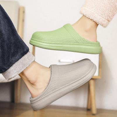 China CUSHIONING TX 2021 New Winter Cotton Slippers Women Solid Color Waterproof Warm Shoes With Thick Soles For Men Lovers Home Slippers for sale