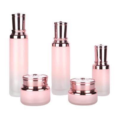 China Hot New Cosmetic Packaging Products Perfume Elegant Pink Glass Bottle Lotion Glass Bottle Cosmetic Luxury Set Skin Care for sale