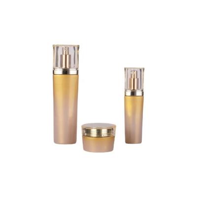 China Amber Gold Matt Packaging Luxury Gold Top Cover Gradient Transparent Glass Bottle Cosmetics Factory Price Cosmetics Dropper Bottle for sale