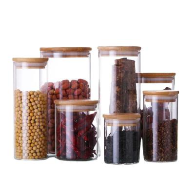 China Freshness Retention BPA Free Borosilicate Glass Storage Jars Glass Water Set Jar With Bamboo Lids for sale