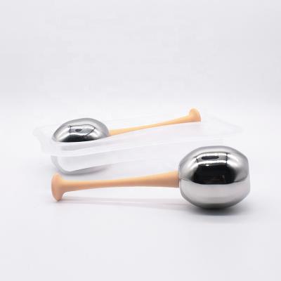 China Face Stainless Steel Ice Metal Sticks Black And Yellow Facial Globes For Ice Cooling Frozen Ball for sale